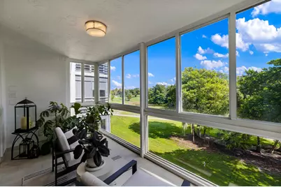 3930 Oaks Clubhouse Drive #401, Pompano Beach, FL 33069 - Photo 13