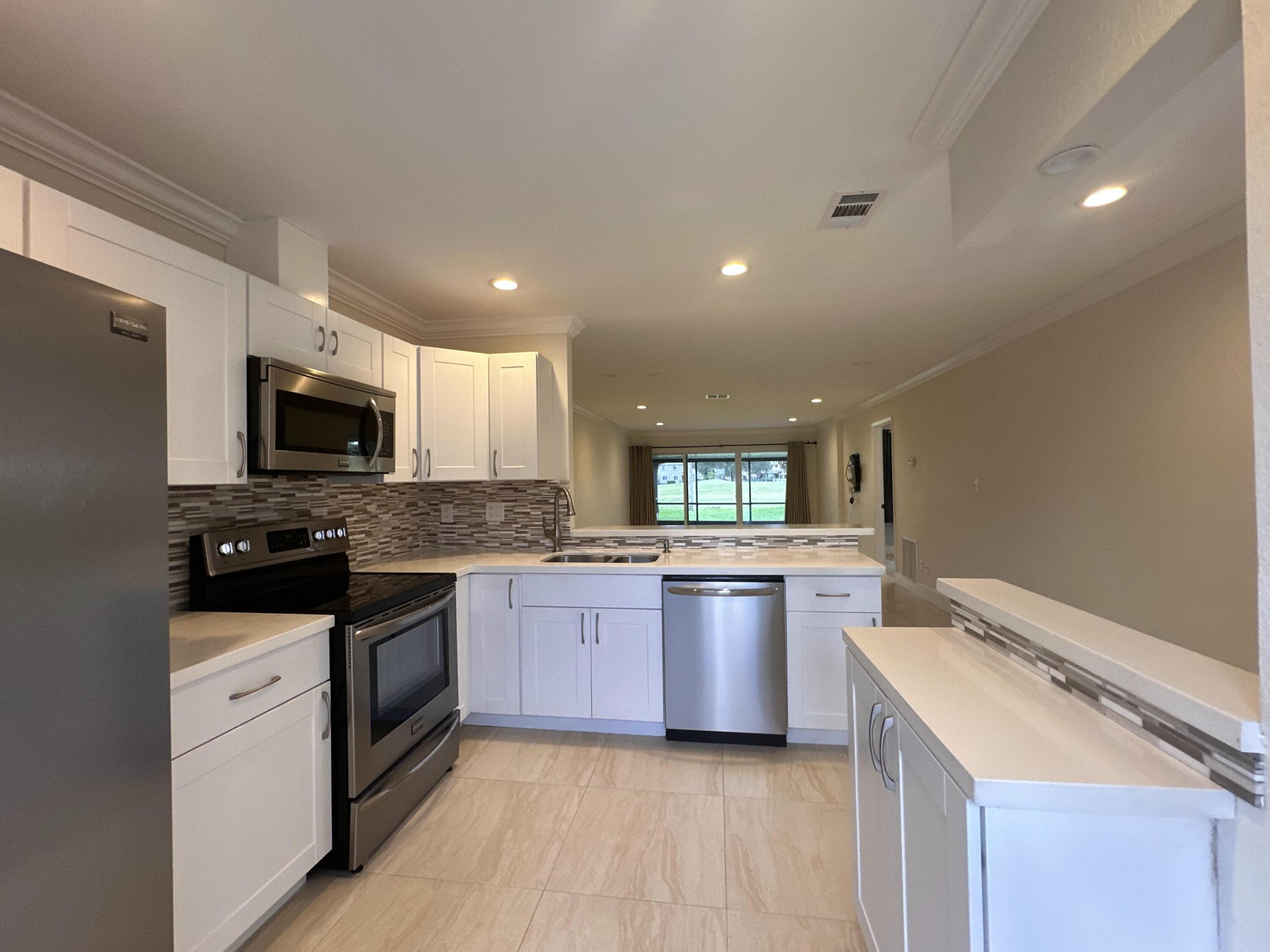 9638 NW 65th St #C10 - 9638 NW 65th St #C10, Tamarac, FL 33321 Luxury Property | Jose Angel Pina