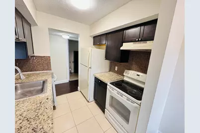 5686 Rock Island Road #115, Tamarac, FL 33319 - Photo 5