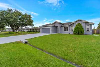 2320 SW Madrid Road, Port Saint Lucie, FL 34953 - Photo 1