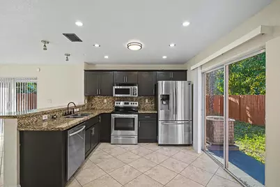 5789 Woodland Point Drive, Tamarac, FL 33319 - Photo 3