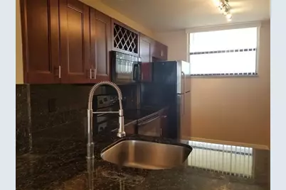 110 Lake Emerald Drive #409, Oakland Park, FL 33309 - Photo 5