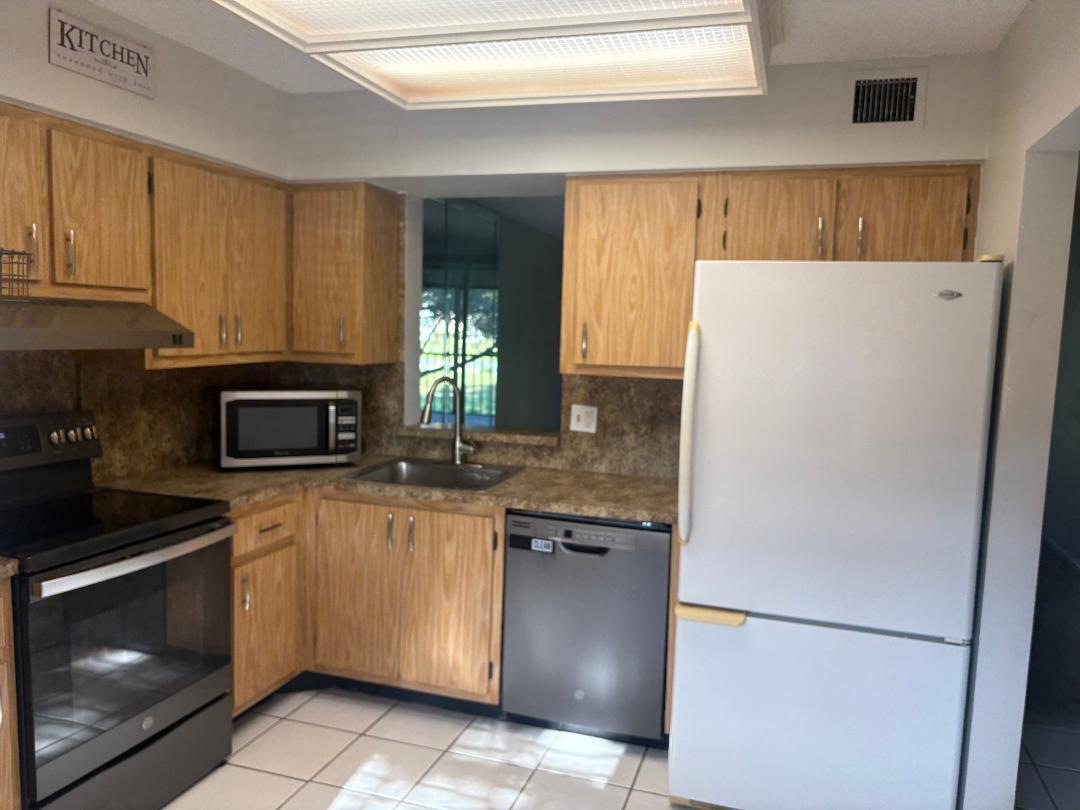 7300 Lake Cir Dr #202 - 7300 Lake Cir Dr #202, Margate, FL 33063 Luxury Property | Jose Angel Pina