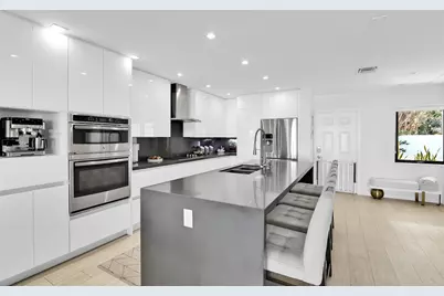 1035 Boca Cove Lane, Highland Beach, FL 33487 - Photo 13