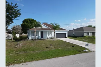 948 SW Jeremko Avenue, Port Saint Lucie, FL 34953 - Photo 1