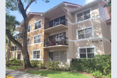 8741 Wiles Road #305, Coral Springs, FL 33067 - Photo 1
