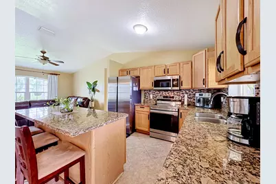 1402 SW Flounder Lane, Port Saint Lucie, FL 34953 - Photo 9