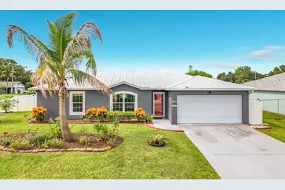 1402 SW Flounder Lane, Port Saint Lucie, FL 34953 - Photo 1