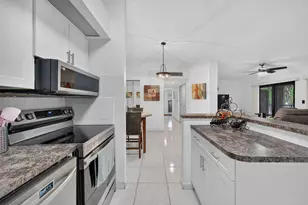 9474 S Belfort Cir, Tamarac, FL 33321 - Photo 7
