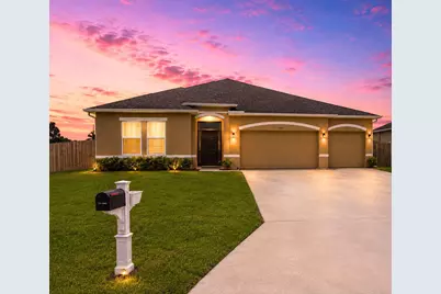 1008 SW Ingrassina Avenue SW, Port Saint Lucie, FL 34953 - Photo 1