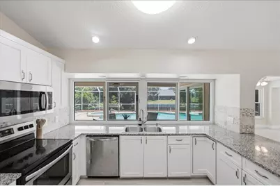 320 NE Surfside Avenue, Port Saint Lucie, FL 34983 - Photo 11