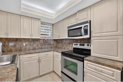 7033 Rain Forest Drive #D-4-L, Boca Raton, FL 33434 - Photo 3