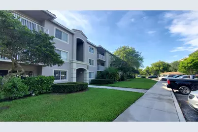 5011 Wiles Road #104, Coconut Creek, FL 33073 - Photo 1