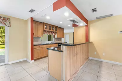 8645 Square Lake Drive, Palm Beach Gardens, FL 33418 - Photo 5