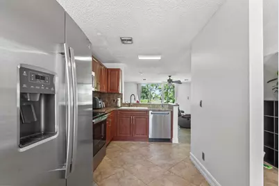 7127 Woodmont Way #7127, Tamarac, FL 33321 - Photo 3