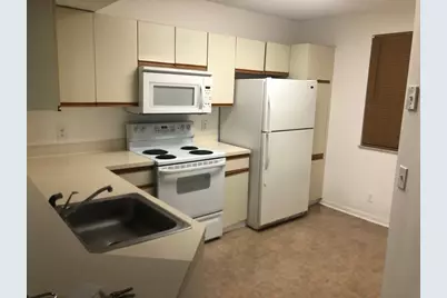 8781 Wiles Road #201, Coral Springs, FL 33067 - Photo 1