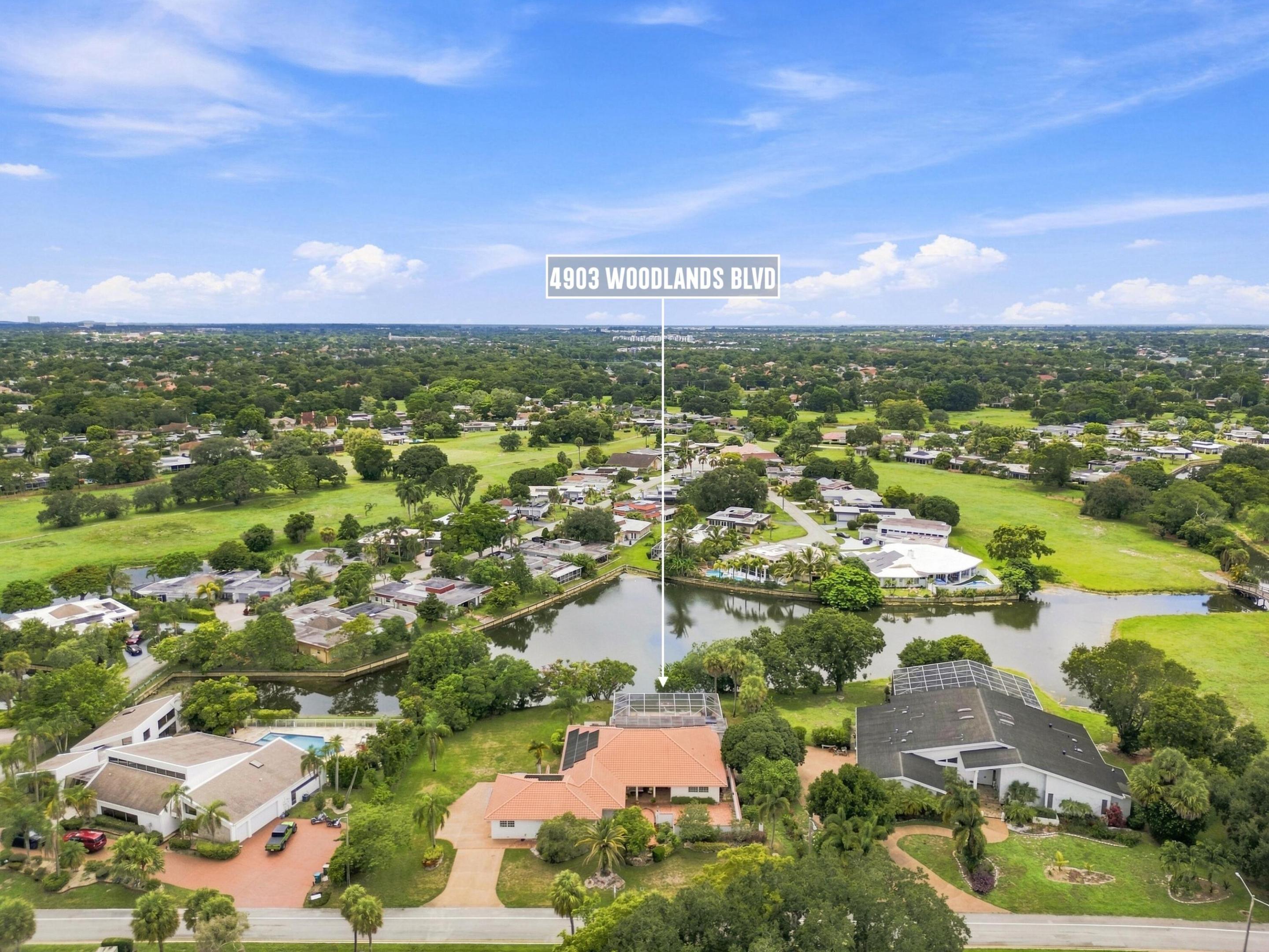 4903 Woodlands Blvd - 4903 Woodlands Blvd, Tamarac, FL 33319 Luxury Property | Jose Angel Pina