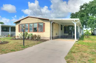 705 Hyacinth Cir, Barefoot Bay, FL 32976 - Photo 1