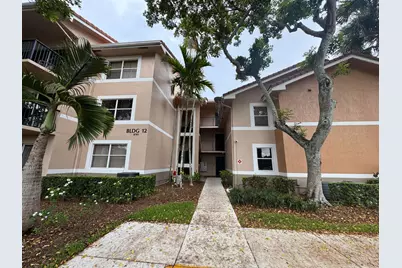 8781 Wiles Road #302, Coral Springs, FL 33067 - Photo 1