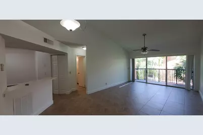 8721 Wiles Road #302, Coral Springs, FL 33067 - Photo 1