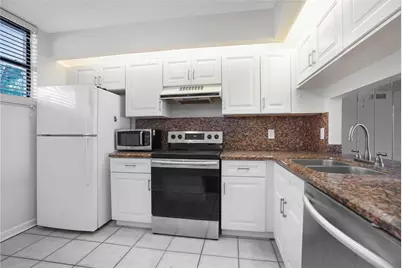 109 Lake Emerald Drive #110, Oakland Park, FL 33309 - Photo 5