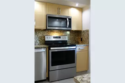2600 S Course Drive #104, Pompano Beach, FL 33069 - Photo 1