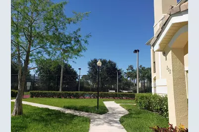104 SW Peacock Boulevard #3-104, Port Saint Lucie, FL 34986 - Photo 1