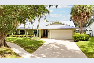 6577 Woodloch Court, Jupiter, FL 33458 - Photo 1