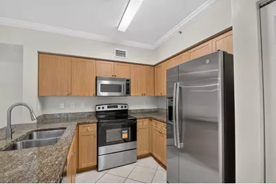 6370 Emerald Dunes Drive #203, West Palm Beach, FL 33411 - Photo 1