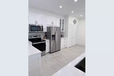 1640 Twelve Oaks Way #305, North Palm Beach, FL 33408 - Photo 3
