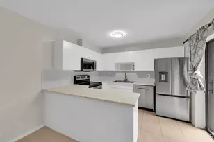 5857 SE Windsong Ln, Stuart, FL 34997 - Photo 13