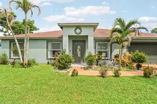 825 SE Cavern Ave, Port Saint Lucie, FL 34983 - Photo 1
