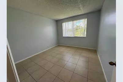 8891 Wiles Road #303, Coral Springs, FL 33067 - Photo 5