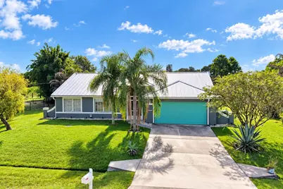 2461 SE Rock Springs Drive, Port Saint Lucie, FL 34952 - Photo 1
