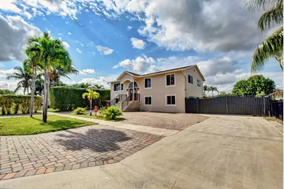 1371 Woodcrest Road W, West Palm Beach, FL 33417 - Photo 1