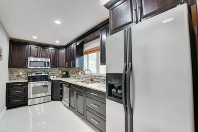 1371 Woodcrest Road W, West Palm Beach, FL 33417 - Photo 27