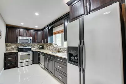 1371 Woodcrest Road W, West Palm Beach, FL 33417 - Photo 15