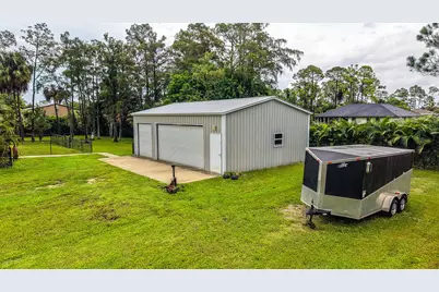 16395 E Hialeah Drive E, The Acreage, FL 33470 - Photo 45
