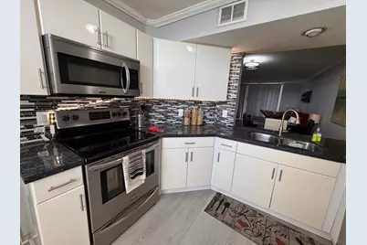 115 Lake Emerald Drive #410, Oakland Park, FL 33309 - Photo 11