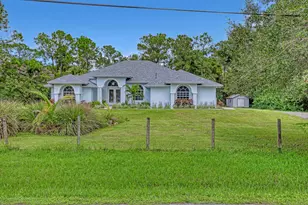 16085 E Secretariat Dr, The Acreage, FL 33470 - Photo 1
