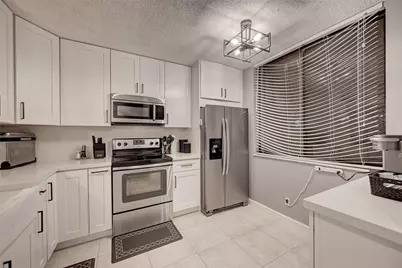 8592 W Sunrise Boulevard #Unit 206, Plantation, FL 33322 - Photo 1