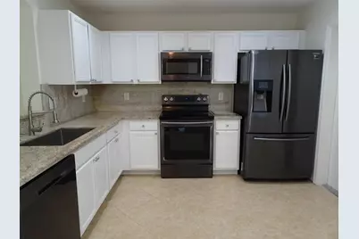 8002 Big Pine Way, Riviera Beach, FL 33407 - Photo 5
