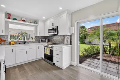 2738 Deer Creek Kelly Brooke Lane, Deerfield Beach, FL 33442 - Photo 11