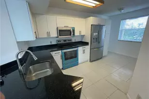 9033 Wiles Rd, Coral Springs, FL 33067 - Photo 3