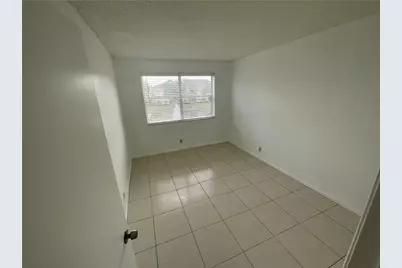 9033 Wiles Road #302, Coral Springs, FL 33067 - Photo 15