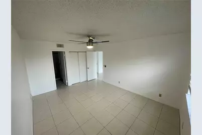9033 Wiles Road #302, Coral Springs, FL 33067 - Photo 13
