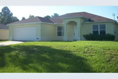 1130 Cove Street E, Lehigh Acres, FL 33974 - Photo 1
