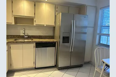 3970 Oaks Clubhouse Drive #310, Pompano Beach, FL 33069 - Photo 15