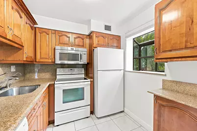 2753 S Oakland Forest Drive #102, Oakland Park, FL 33309 - Photo 13