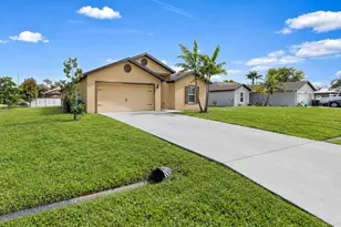 1597 SW Leisure Ln, Port Saint Lucie, FL 34953 - Photo 1
